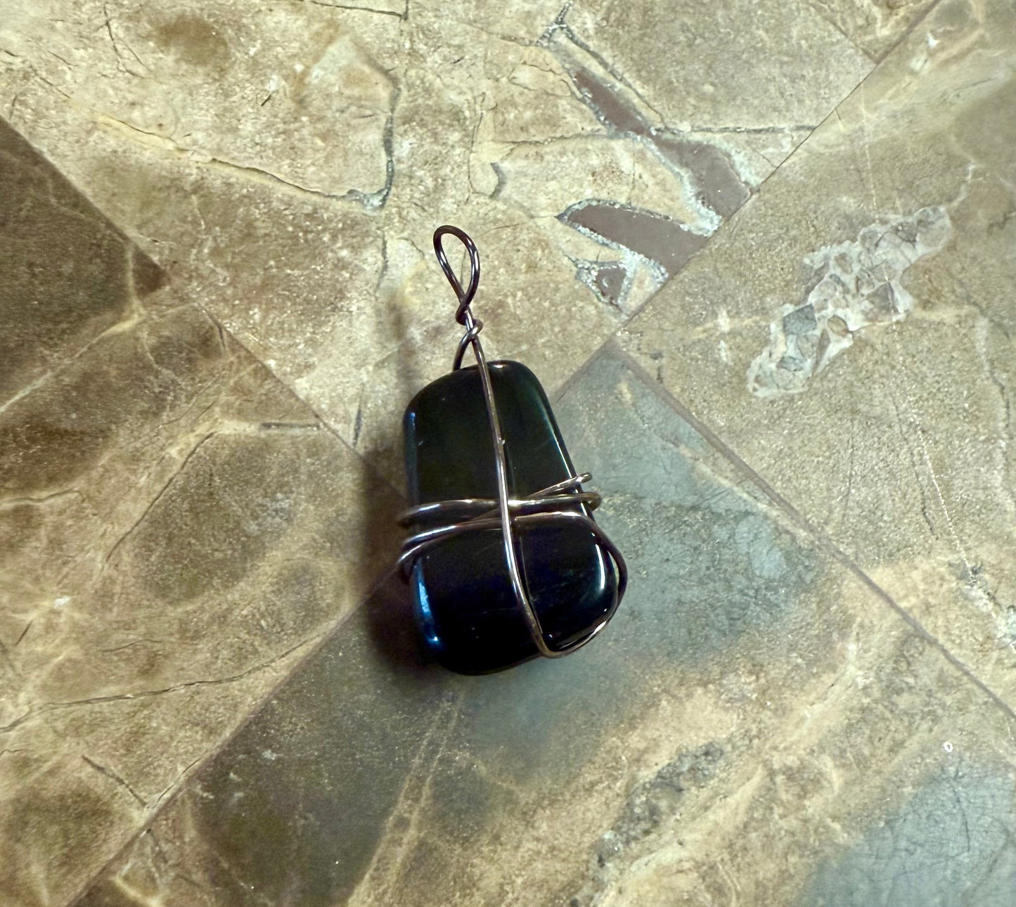 Wire wrapped crystal pendant